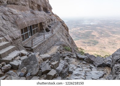 Naneghat, India - a mountain pass in the Western Ghats range between the Konkan coast and the ancient town of Junnar in the Deccan plateau.  Famous for a carved stone container for collecting tolls