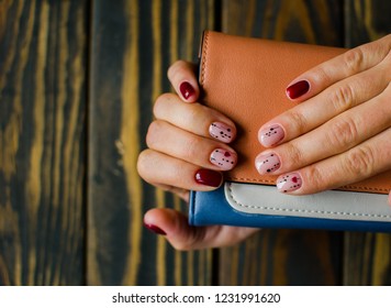 Nanicure Burgundy Color. Nails Design. Nails With Hearts. Top View. Place For Text. St. Valentines Nails Concept.