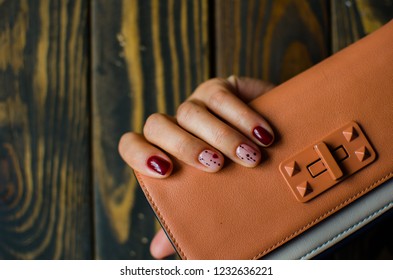 Nanicure Burgundy Color. Nails Design. Nails With Hearts. Top View. Place For Text. St. Valentines Nails Concept.