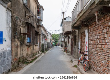 Nanjing, China - October 12, 2019: View Of Small Lane With Old, Shabby Houses On Two Sides At Old Quarter Of Laohutou Unit, Qinhuai, Nanjing, Jiangsu, China. 