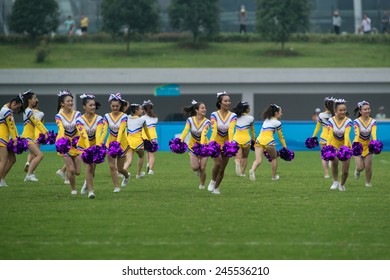 NANJING, CHINA-AUGUST 19: 2014 Summer Youth Olympic Games Cheerleaders Perform At Half-time Of Day 3 Match Of 2014 Youth Olympic Games On August 19, 2014 In Nanjing, China.