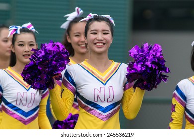 NANJING, CHINA-AUGUST 19: 2014 Summer Youth Olympic Games Cheerleaders Perform At Half-time Of Day 3 Match Of 2014 Youth Olympic Games On August 19, 2014 In Nanjing, China.