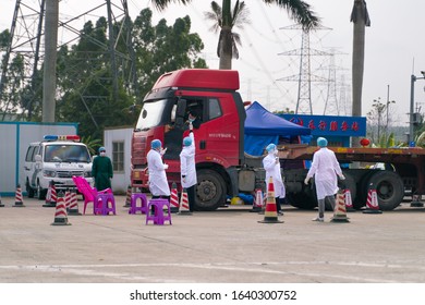 Nanning/China-06.02.20:The Coronavirus Check Post On Highway. Doctors Checking Body Temperature.