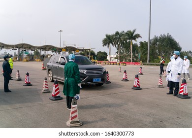 Nanning/China-06.02.20:The Coronavirus Check Post On Highway. Doctors Checking Body Temperature.