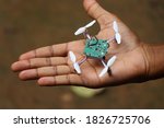 nano drone also called by names mini drones or quadcopter held in hand