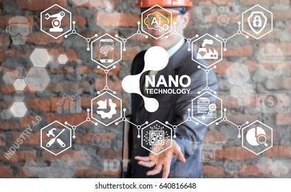 NANO Future Innovative Technologies Integration Industry 4.0 Concept. Industrial Nanotechnology. Information technology in manufacture. Man in safety helmet offer nano icon on virtual screen. - Shutterstock ID 640816648