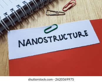Nanostructure writting on table background. - Powered by Shutterstock - Get 15% off with code: PIKWIZARD15