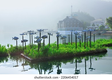 Nantou County, Taiwan - June 9, 2009: The Installation Art Of Fish School In The Tranquil Sun Moon Lake Is A Famous Tourist Attraction