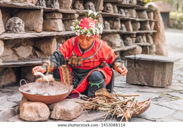 Nantou\
County, Yuchi Township / Taiwan - 06.17.2019: Taiwanese indigenous\
peoples in Formosan Aboriginal Culture\
Village