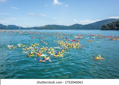 Nantou, Taiwan - September First, 2019: Sun Moon Lake Swimming Carnival With Huge Numbers Of People Swimming To Cross The Lake, Nantou, Taiwan