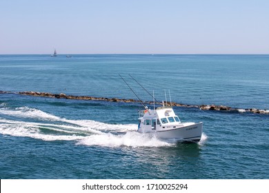 NANTUCKET, MA - APRIL 10, 2020: Fishing Boat In Motion In The Nantucket Harbor.