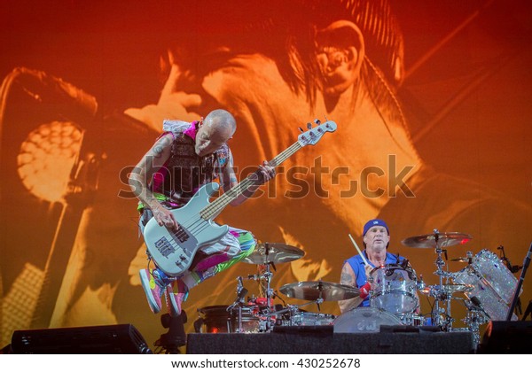 Napa, CA/USA - 5/29/16: Flea of Red\
Hot Chili Peppers jumps at BottleRock 2016 in Napa, Ca.\
