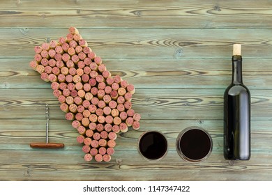 Napa Valley Wine Region Map With Bottle Of Red Wine And Two Full Glasses On A Rustic Wood Background With Copy Space