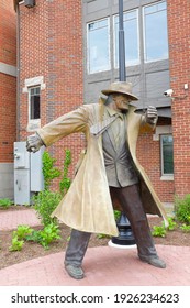 NAPERVILLE, ILLINOIS - MAY 26, 2017: Dick Tracy Statue. Located Along The City River Walk At The Naperville Township Building. Town Resident Dick Locher Became Illustrator Of The Strip In 1983.