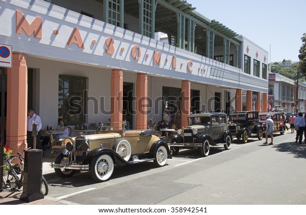 NAPIER ART DECO FESTIVAL NEW ZEALAND - CIRCA 2015\
- Classic vintage cars outside the Masonic Hotel in the art deco\
town of Napier New\
Zealand