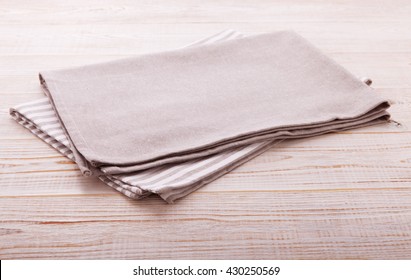 Napkin. Cloth Napkin In Perspective On White Wooden Background.Top View, Mock Up.