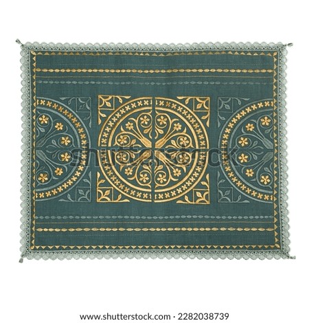 Napkin on the table with a beautiful, chic embroidery in oriental style, isolate on white. Oriental pattern, for interior decoration, stylish design.