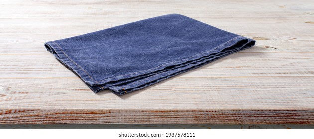 Napkin On White Wooden Table Top View Mockup.