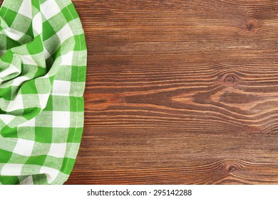Napkin on wooden background - Shutterstock ID 295142288