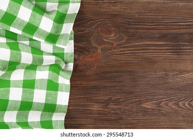 Napkin on wooden background - Shutterstock ID 295548713