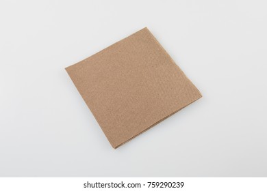 Napkins Isolated On White. Brown Napkin Paper For Restaurant