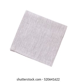 Napkins isolated on white. White linen napkins for restaurant. Empty napkins mock up for design. Napkins top view close up. Place for text on napkin.