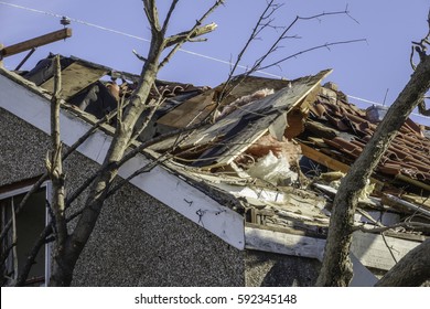 NAPLATE, ILLINOIS/USA - MARCH 3, 2017: A Ruined Corner Of The Roof On A House Severely Damaged By An EF-3 (enhanced Fujita Scale) Tornado That Devastated This Small Town On February 28.