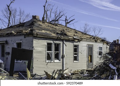 NAPLATE, IL/USA - MARCH 3, 2017: An EF-3 (enhanced Fujita Scale) Tornado Blasted This Small Town On February 28, Including This Small House, Which Stands In Need Of A New Roof And Many Other Repairs.