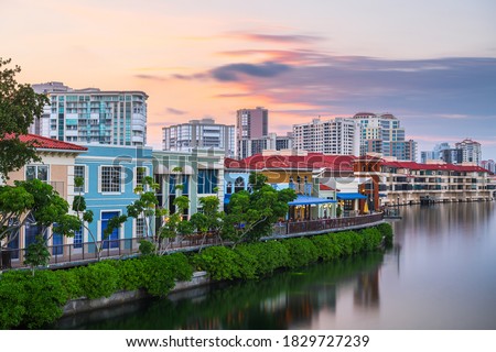 Naples, Florida, USA downtown cityscape on the bay at dusk.