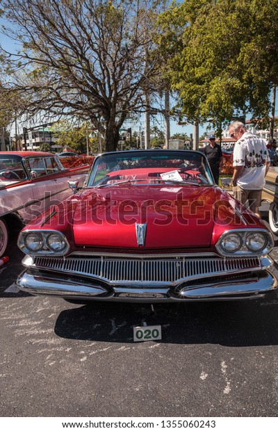 Naples, Florida, USA – March 23,2019: Red 1960\
Dodge at the 32nd Annual Naples Depot Classic Car Show in Naples,\
Florida. Editorial\
only.