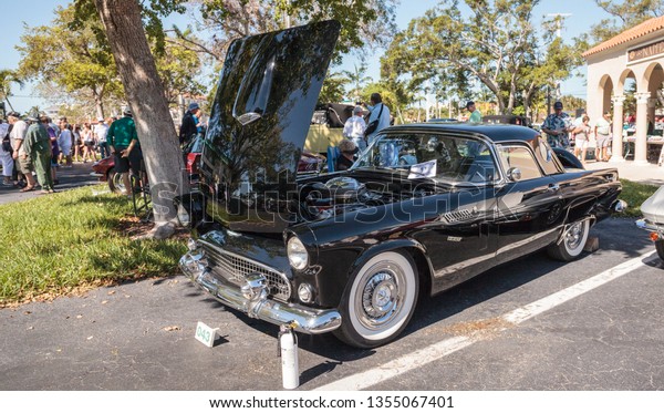 Naples, Florida, USA – March 23,2019:\
Black 1956 Ford Thunderbird at the 32nd Annual Naples Depot Classic\
Car Show in Naples, Florida. Editorial\
only.
