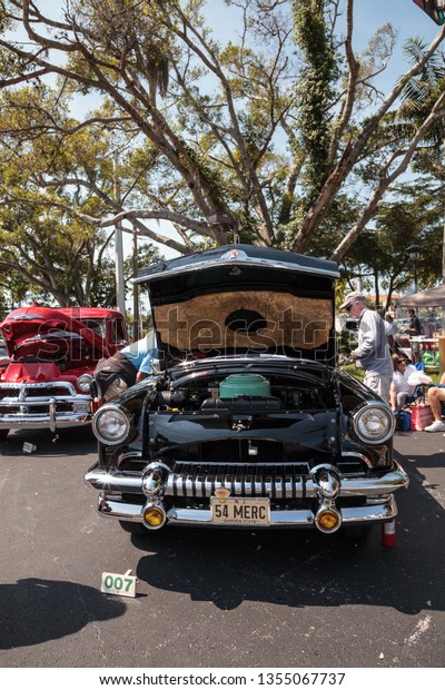 Naples, Florida, USA –\
March 23,2019: Black 1954 Mercury Monterey Convertible at the 32nd\
Annual Naples Depot Classic Car Show in Naples, Florida. Editorial\
only.