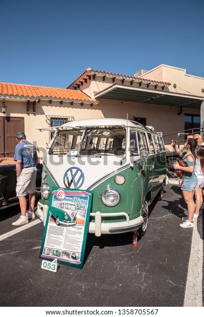 Naples, Florida, USA – March\
23,2019: Green and white 1967 Volkswagen Micro Bus at the 32nd\
Annual Naples Depot Classic Car Show in Naples, Florida. Editorial\
only.