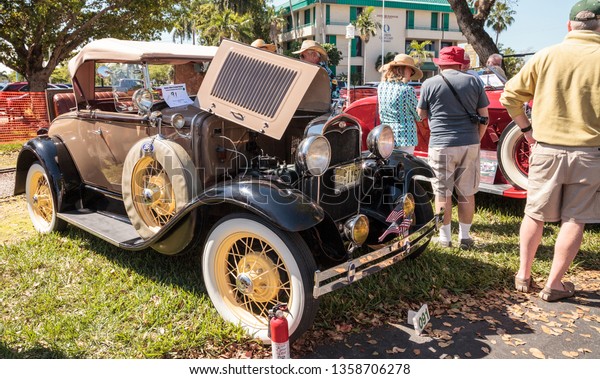 Naples, Florida, USA – March\
23,2019: Tan 1931 Ford Model A Deluxe Tudor Sedan at the 32nd\
Annual Naples Depot Classic Car Show in Naples, Florida. Editorial\
only.