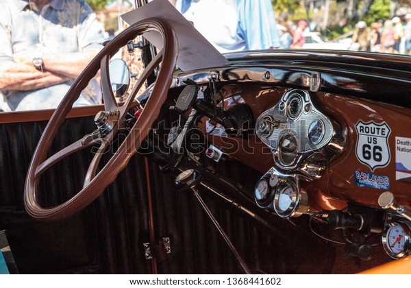 Naples, Florida, USA – March\
23,2019: Tan 1930 Ford Model A Deluxe Fordor at the 32nd Annual\
Naples Depot Classic Car Show in Naples, Florida. Editorial\
only.