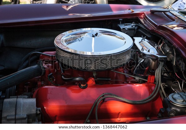 Naples, Florida, USA – March 23,2019: Red 1967\
Corvette at the 32nd Annual Naples Depot Classic Car Show in\
Naples, Florida. Editorial\
only.
