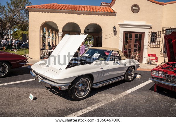 Naples, Florida, USA – March 23,2019: White 1966\
Corvette at the 32nd Annual Naples Depot Classic Car Show in\
Naples, Florida. Editorial\
only.