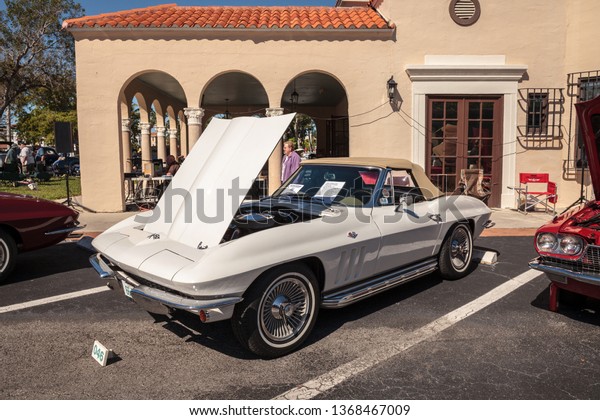 Naples, Florida, USA – March 23,2019: White 1966\
Corvette at the 32nd Annual Naples Depot Classic Car Show in\
Naples, Florida. Editorial\
only.