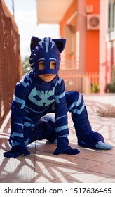 Naples Italy February 27, 2018. Child Dressed As A Catboy, Animated Pj Mask. Carnival Costume