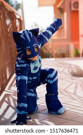 Naples Italy February 27, 2018. Child Dressed As A Catboy, Animated Pj Mask. Carnival Costume