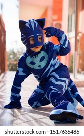 Naples Italy February 27, 2018. Child Dressed As A Catboy, Animated Pj Mask. Carnival Costume