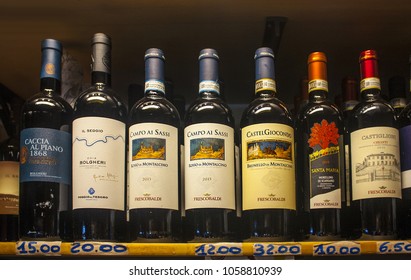 Naples, Italy - March 5, 2018: Shelf shop with bottles of italian wine