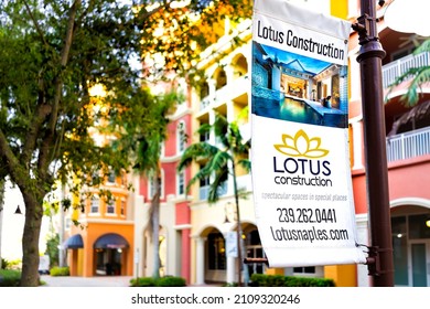 Naples, USA - September 13, 2021: Naples, Florida Bayfront Street Condo Architecture Building With Sign For Lotus Construction Business For Luxury Real Estate