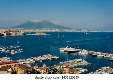 Naples,Campania/Italy- June 19,2019: Picturesque Naples, Volcano Vesuvius and Egg Castle from aerial view. Tourism in Europe