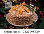 Napoleon cake on a fir background. Christmas cake. Napoleon cake for Christmas dinner