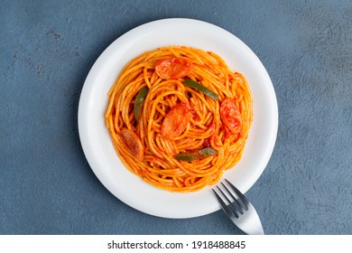 Napolitan Spaghetti And Blue Background