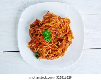 Naporitan - Japan dish consists of spaghetti, tomato ketchup., green peppers, sausage, bacon and Tabasco sauce