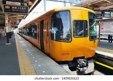 Nara, JP - JUNE 5, 2017: The New Modern High-speed Yellow Express Train Stopped For Waiting Passengers For Kami-Honmachi Station In Kintetsu Railway Line.