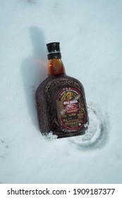 Narkanda, Shimla, HP India : 4th February, 2021 - A Full Bottle Of Old Monk Indian Dark Rum (it Fights With Cold And Cough During Winter) On The Snowy Surface In Shimla.