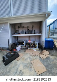 Narraganset, Rhode Island, USA Walk In Freezer Refrigeration Condensing Unit And Evaporator In Shipping Container Being Dropped Off At Location. Mechanical Contractor Installation.